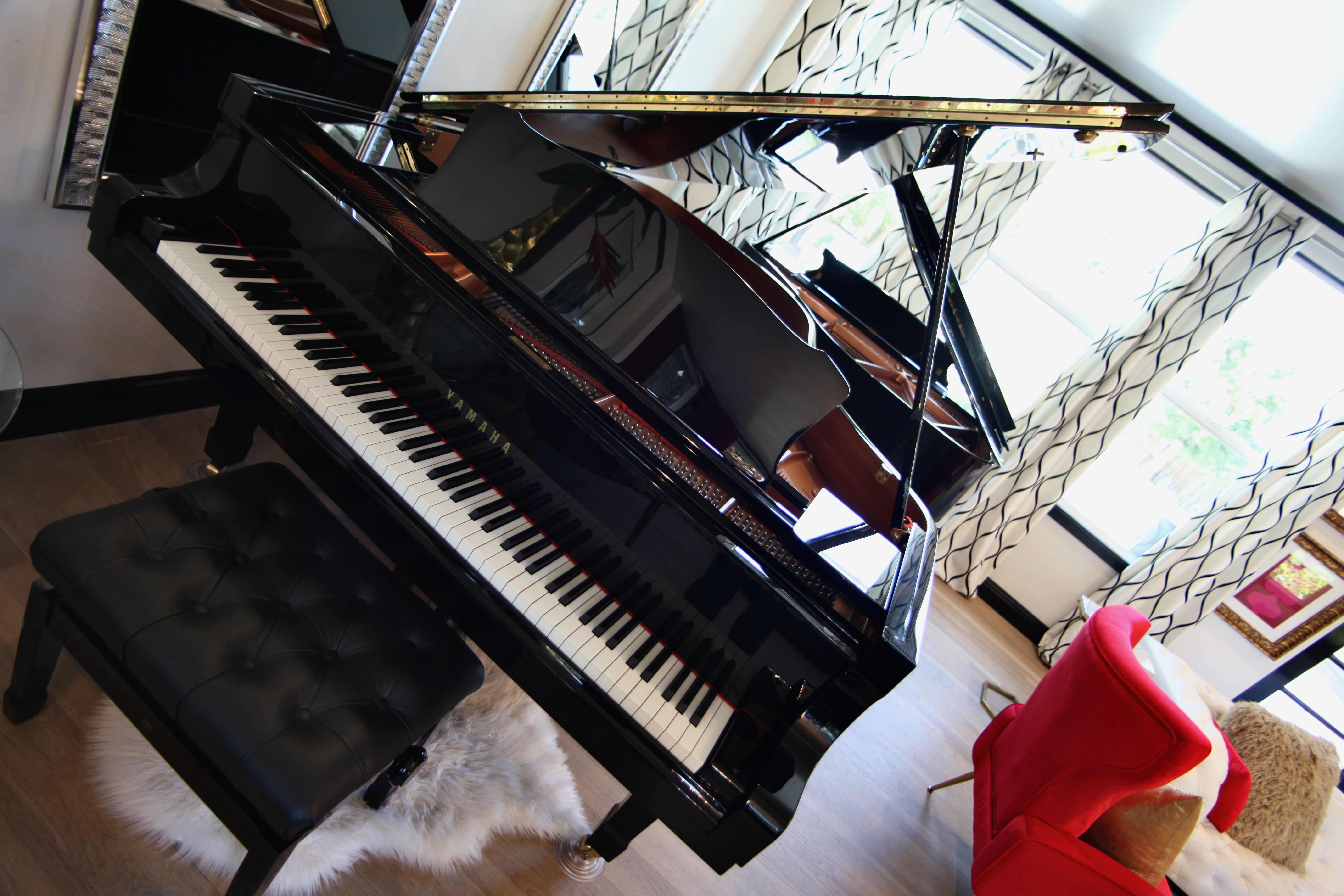 The grand piano in Harmony House's Art Deco music room